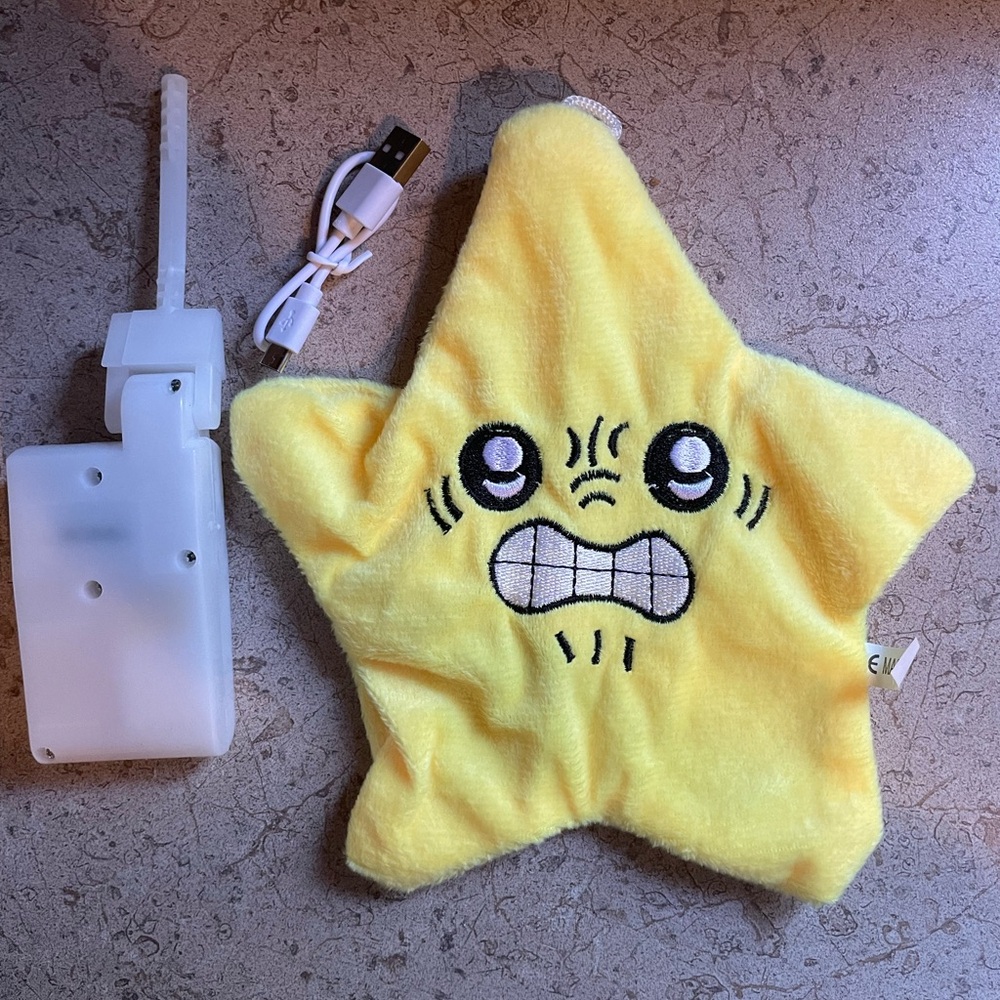 Battery operated yellow angry star toy
